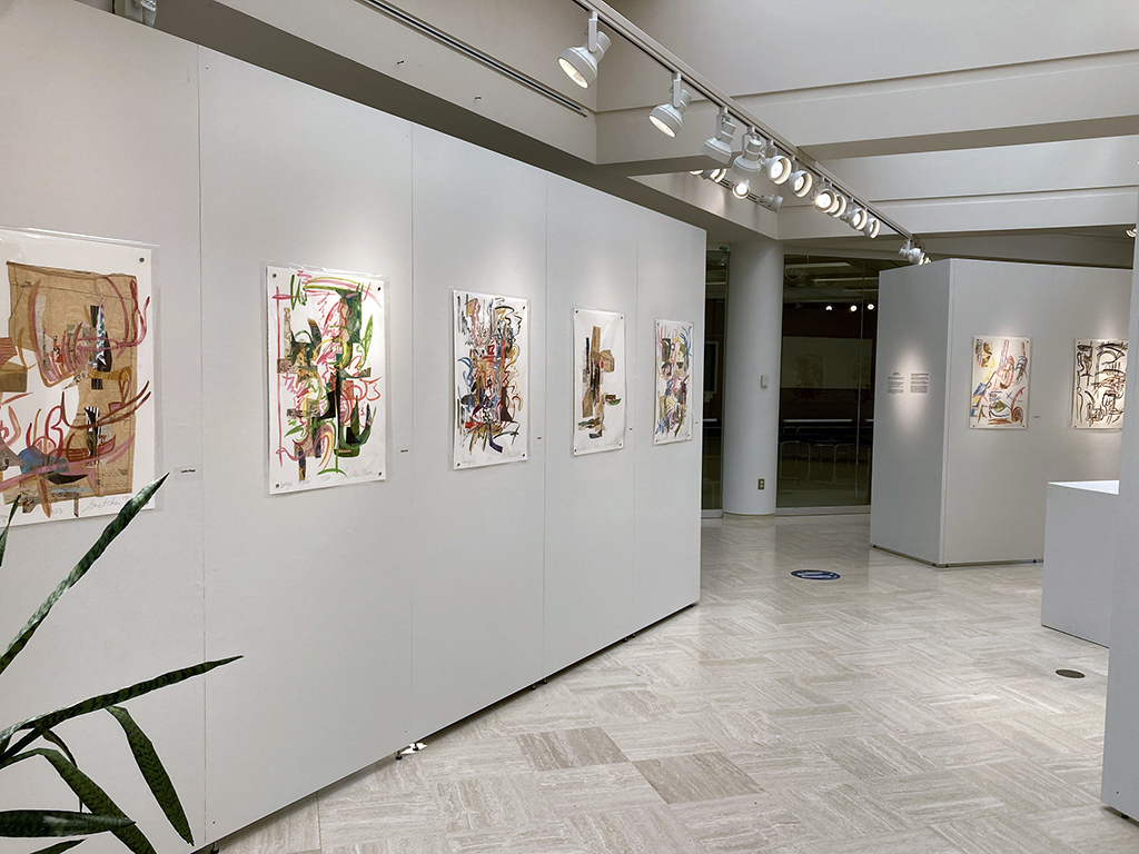 Office wall looking toward door: Beck paintings